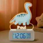 Miniaturansicht von Dino-Wecker mit Licht und personalisiertem Namen