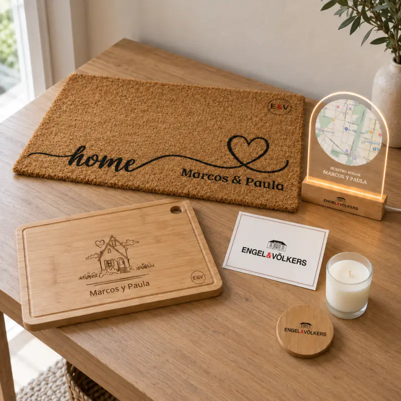 Kit de boas-vindas a casa com tapete de entrada, tábua de cortar e detalhes personalizados com a marca Engel & Völkers